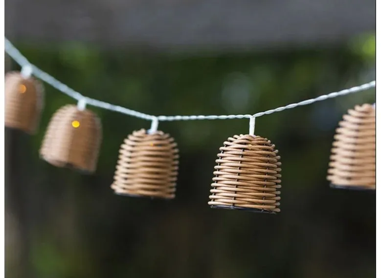 Guirlande lumineuse solaire 10 abat-jour poly rotin LED blanc chaud FORMENTERA